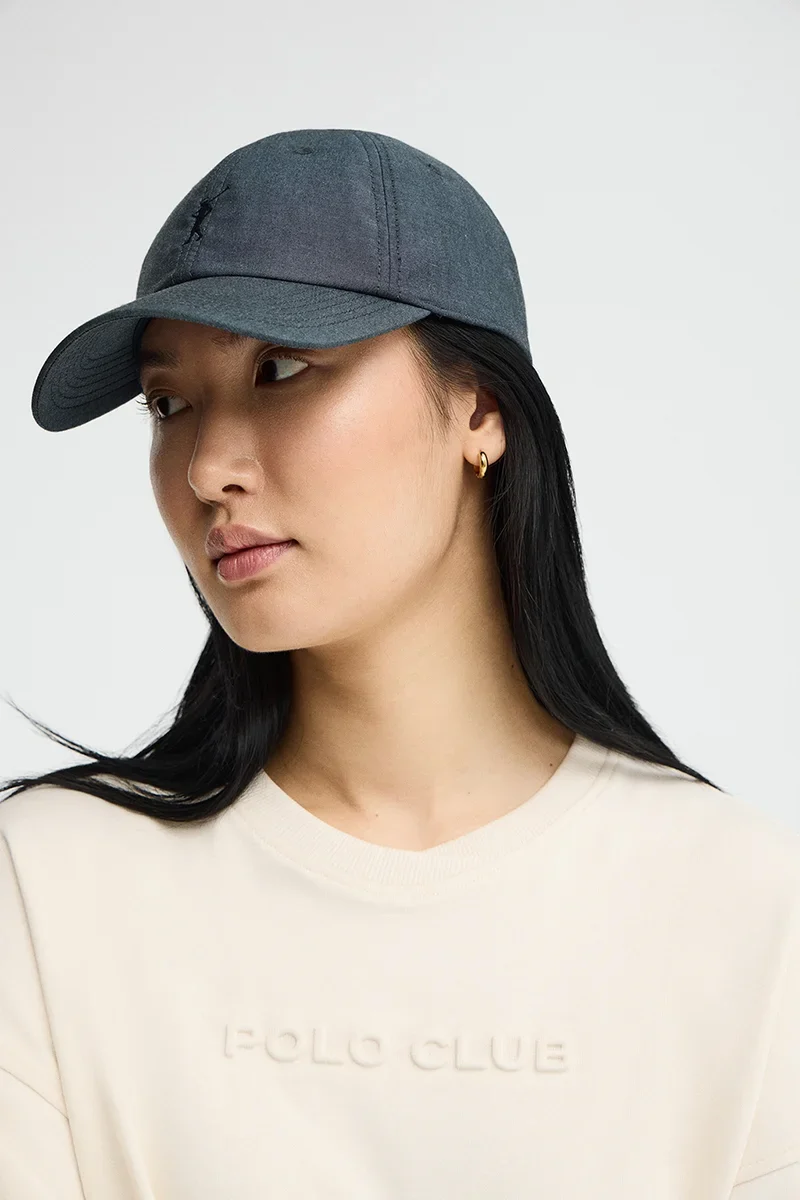 Gorra de chambray azul denim de seis paneles y logo Rigby Go