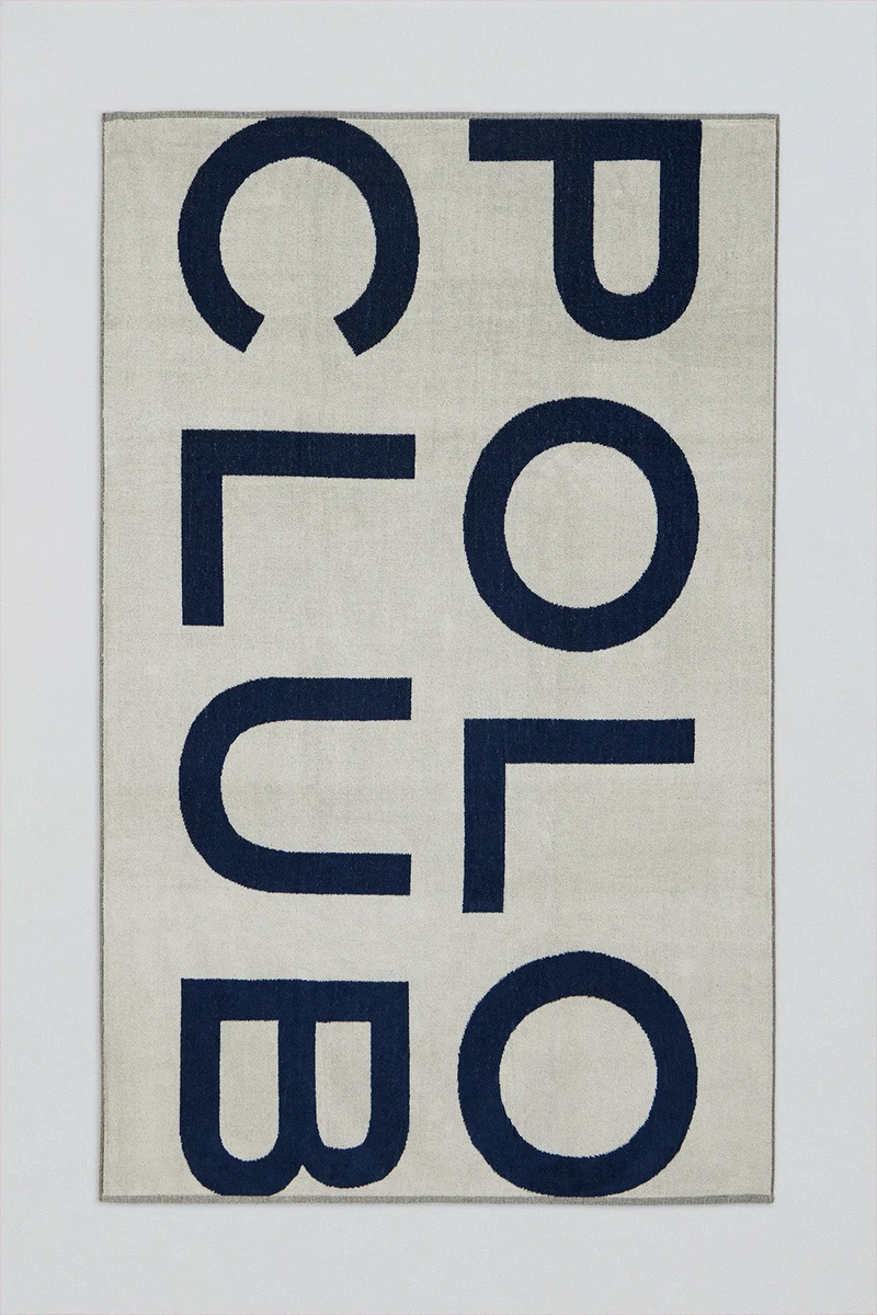 Toalla beige de rizo Antibes con logotipo