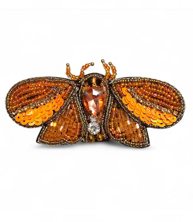 FAIRTRADE broche MOT ORANJE met pailetten en kralen