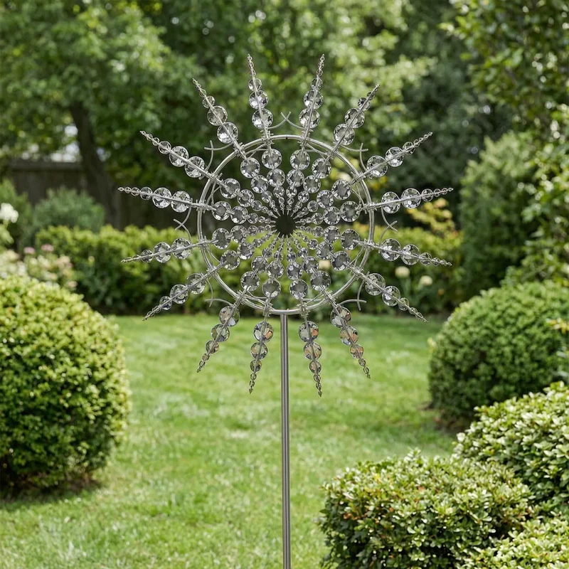 Kinetische metalen windspinner op steker